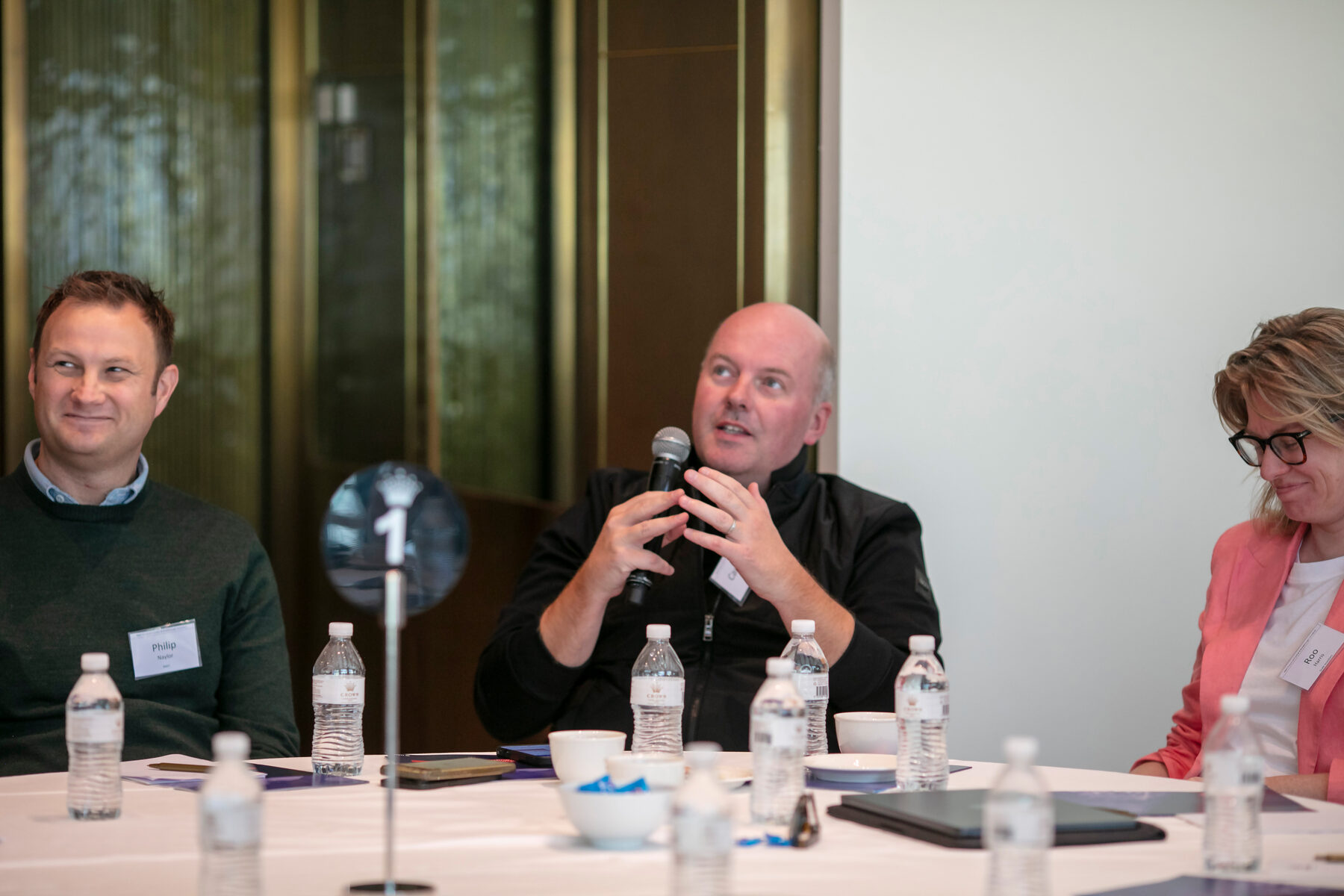 Participants engaged in a roundtable discussion